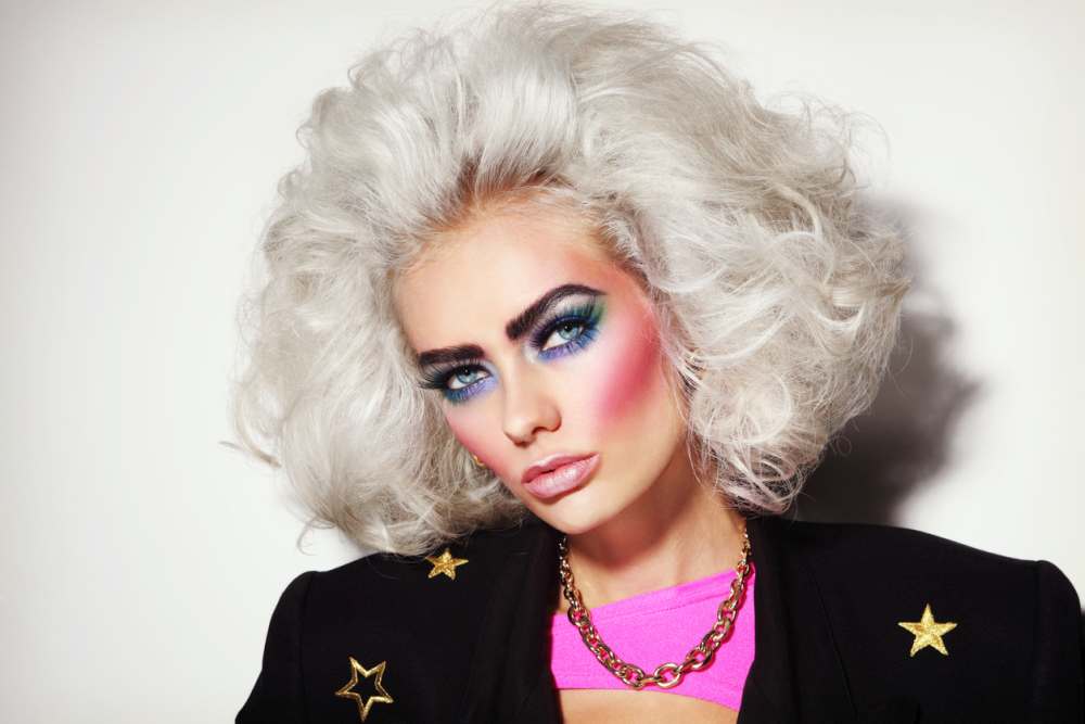 Woman with 80s hairstyle and makeup