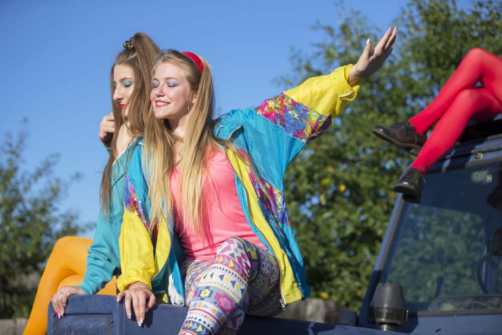 Women wearing bright and colorful outfits